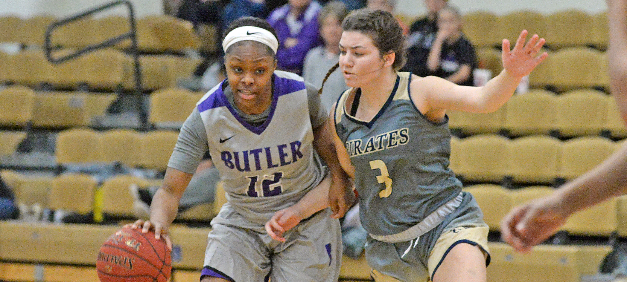 Macie Price (3) guard Butler's Jalisa Smallwood (12) Photo credit: Randy Smith / Butler CC Athletics